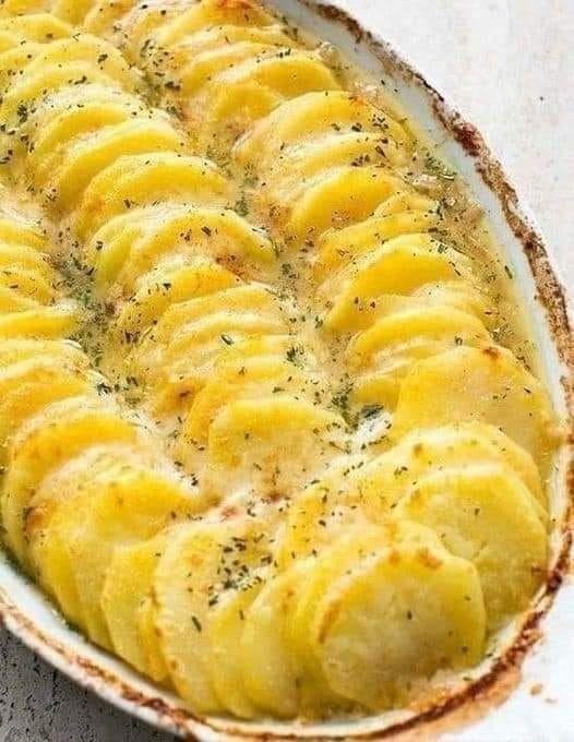 Fried potatoes with cheese and garlic are easy and delicious